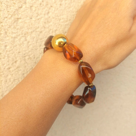 Bracelet élastique grosses perles irrégulières en résine acrylique couleur ambre style bohème